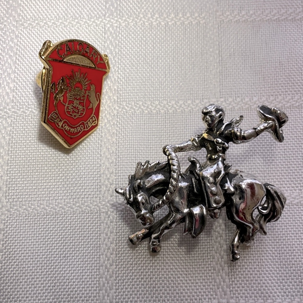 Silver Cowboy/Rodeo Brooch and Calgary Pin